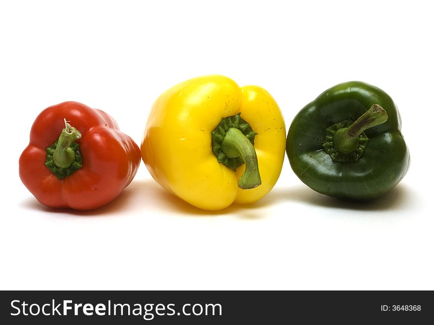 Three peppers on the white background