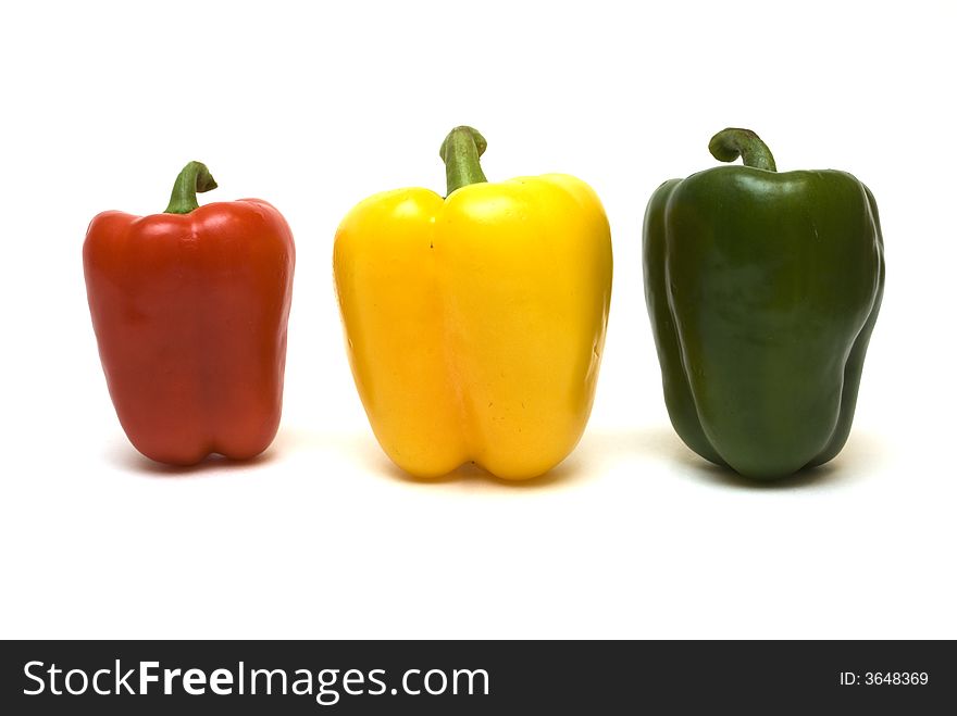 Three peppers on the white background