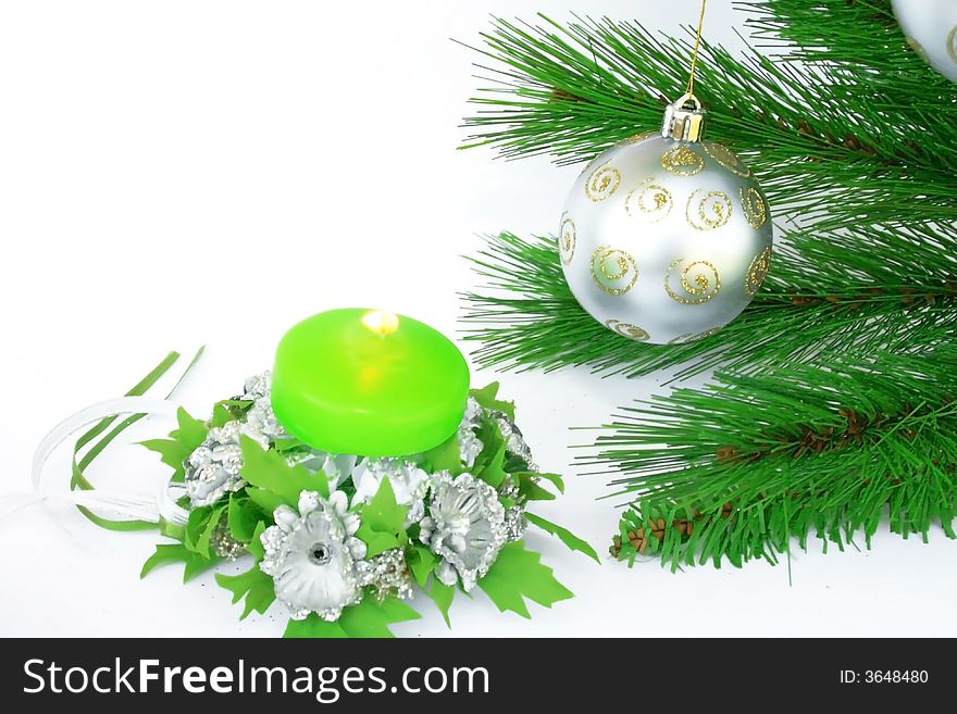 Christmas ornaments.Gray ball,fir-tree,candle,silvery flowers.