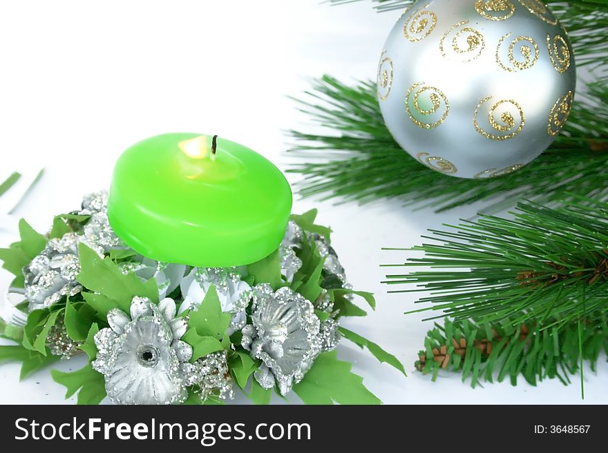 Christmas ornaments.Gray ball,fir-tree,candle,flowers.