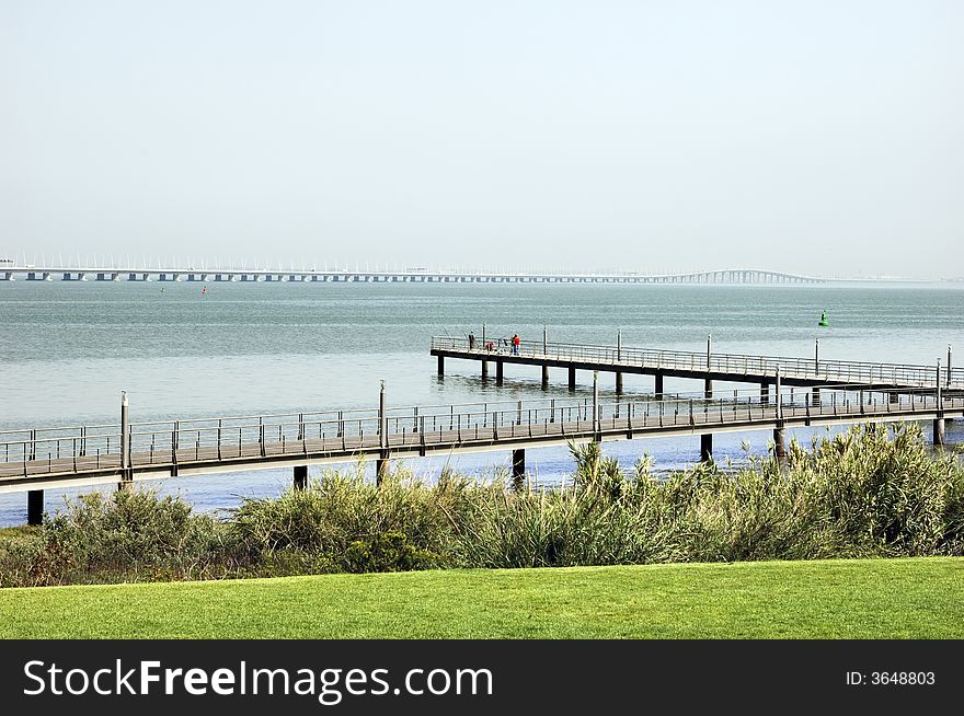 Fisher mans in a pontoon over the river Tagus, Portugal. Fisher mans in a pontoon over the river Tagus, Portugal