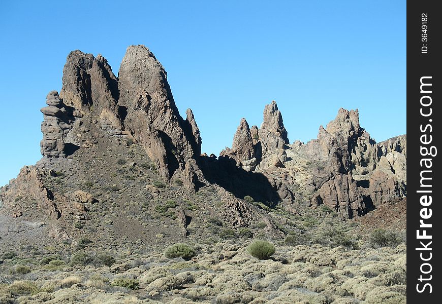 The Roques de Garcia mountains and the Teide volcano as a background (Las Canadas national park, Tenerife).