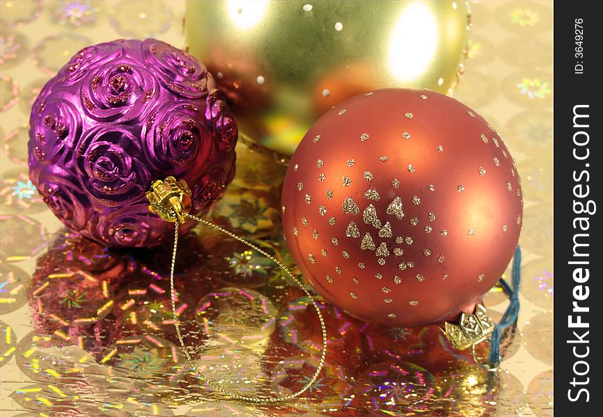 Colorful christmas balls on golden background. Colorful christmas balls on golden background