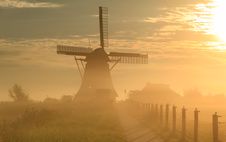 Foggy Sunrise At Windmill Royalty Free Stock Image Foggy Sunrise At Windmill Royalty Free Stock Image