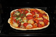 Ready Home Pizza In Open Black Oven Stock Photos