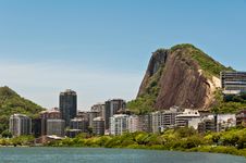 Residential Buildings And Mountains Around The Lake Royalty Free Stock Image Residential Buildings And Mountains Around The Lake Royalty Free Stock Image