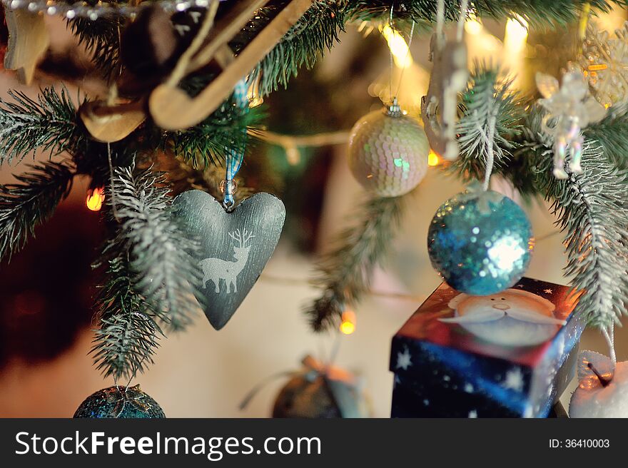 Colorful bright and beautiful Christmas tree decorated with toys on the new year. Colorful bright and beautiful Christmas tree decorated with toys on the new year