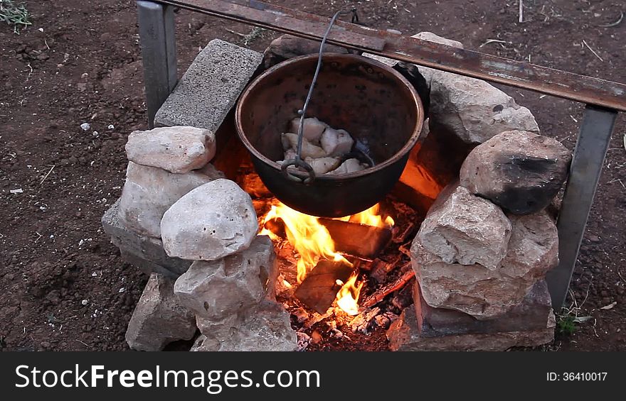 Cooking in the pot on the fire. Cooking in the pot on the fire