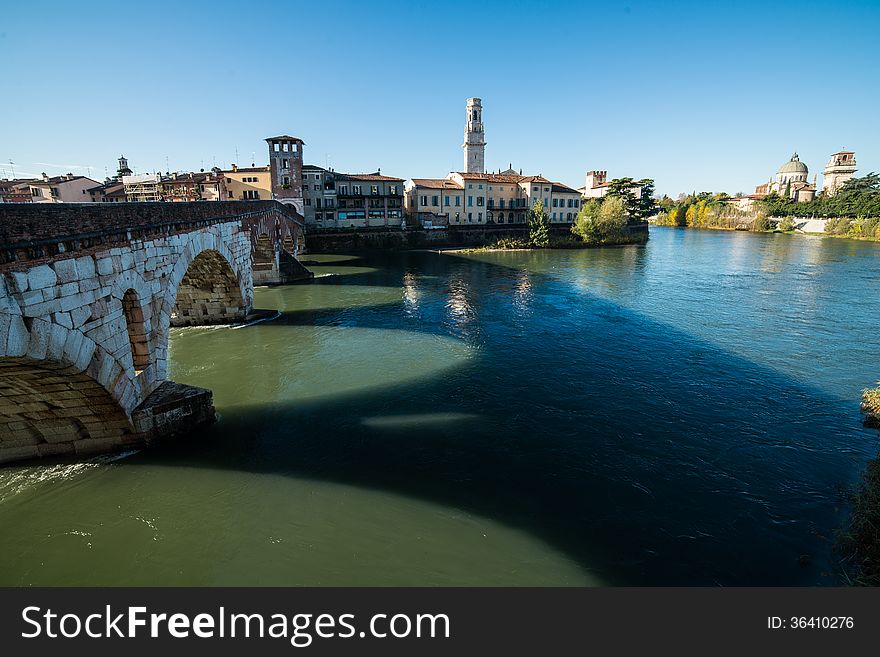 Ponte Pietra and the River Adige, Italy, Europe