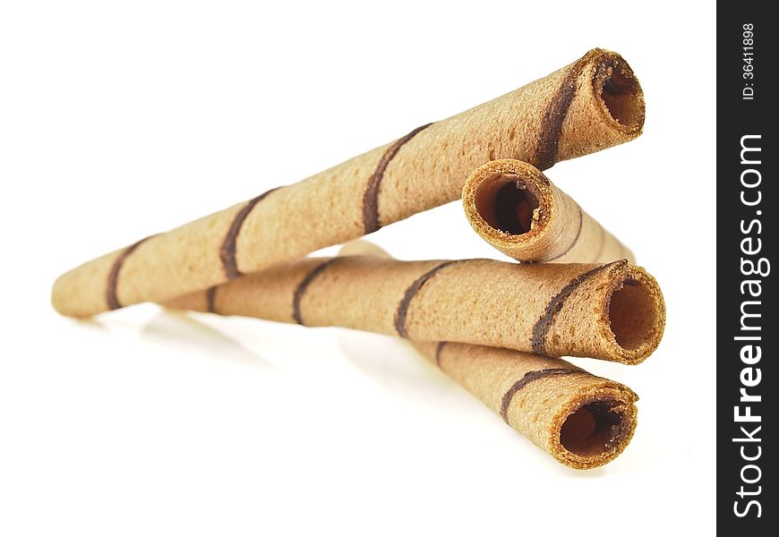 Close up of wafer stick pile on white background. Close up of wafer stick pile on white background