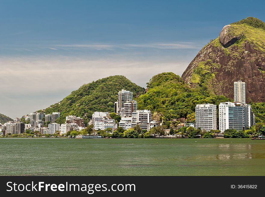 Residential Buildings and Mountains around Rodrigo de Freitas Lake in Rio de Janeiro, Brazil. Residential Buildings and Mountains around Rodrigo de Freitas Lake in Rio de Janeiro, Brazil