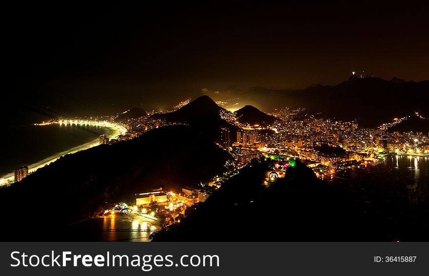 Rio de Janeiro aerial view from the Sugarloaf Mountain by night. Rio de Janeiro aerial view from the Sugarloaf Mountain by night.
