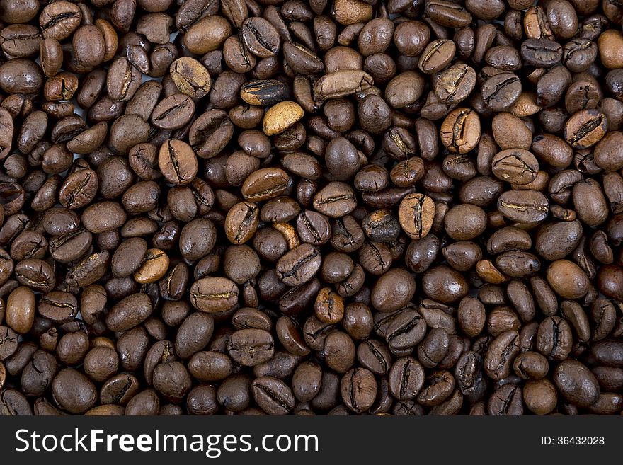 A lot of coffee beans, a background.