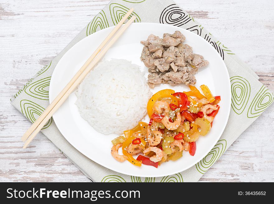 Chinese food-rice, chicken and vegetables with shrimp, top view