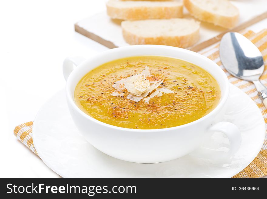 Cream soup of yellow lentils with vegetables in a bowl