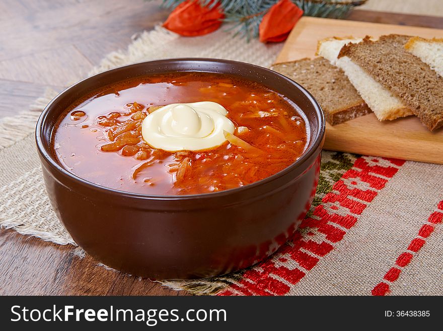 Ukrainian red soup borsch with creme fraiche and bread