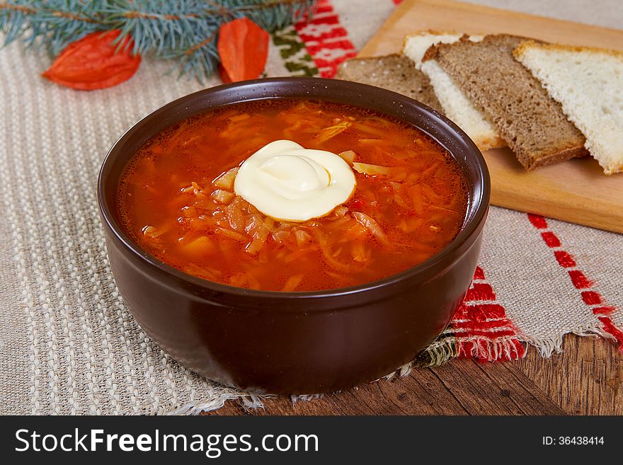 Ukrainian red soup borsch with creme fraiche and bread