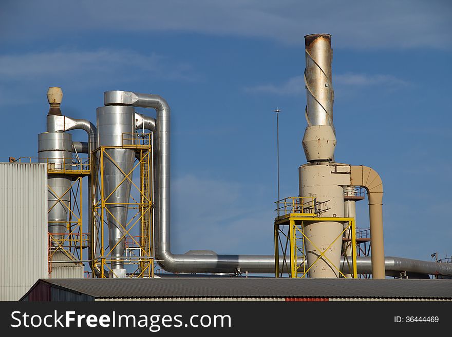 Chimney of a factory silos. Chimney of a factory silos