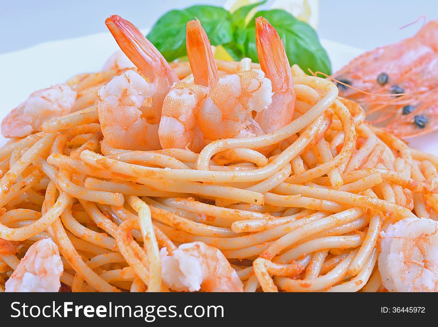 Italian spaghetti with shrimp in tomato sauce