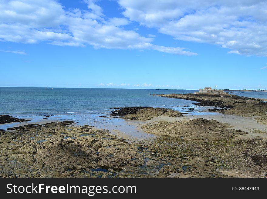 Saint Malo beach and castle in the mid tide time, west cost of France. Saint Malo beach and castle in the mid tide time, west cost of France