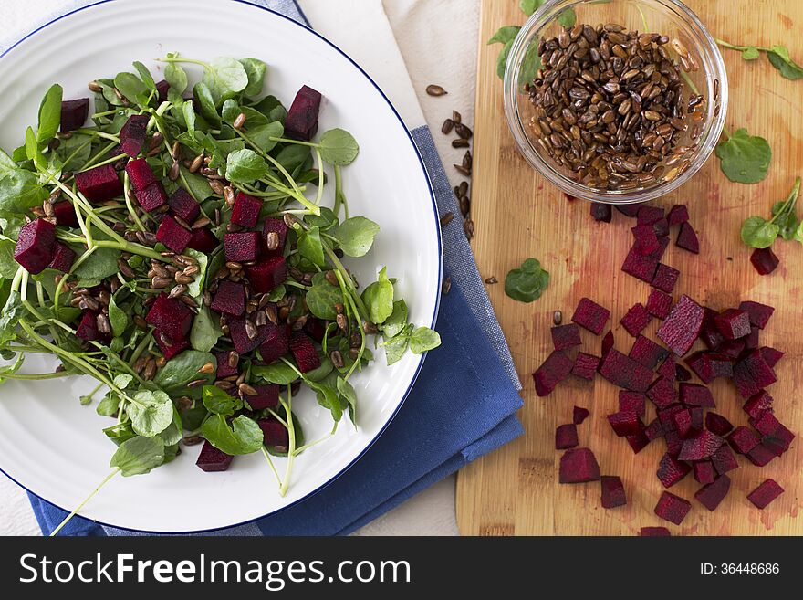 Watercress and beetroot salad with toasted sunflower seeds. Watercress and beetroot salad with toasted sunflower seeds.