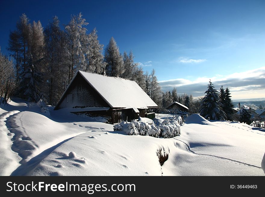 Cottage in snowy landscape, czech countryside cottage. Cottage in snowy landscape, czech countryside cottage