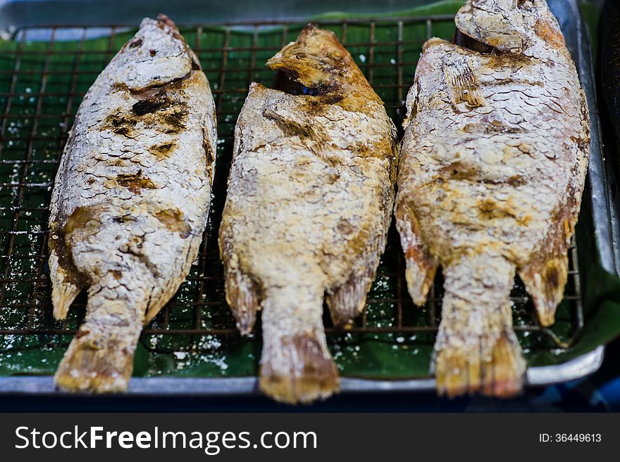 Fish in flour. Barbecue in Thailand. Shallow depth of field