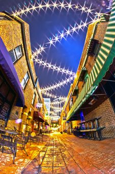 Charlotte, Nc - January 1st, 2014: Night View Of A Narrow Alley Royalty Free Stock Photo