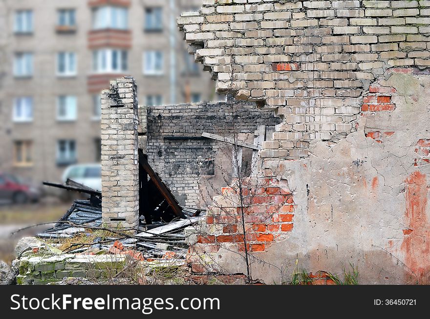 Fragment of the destroyed wall of the scorched building