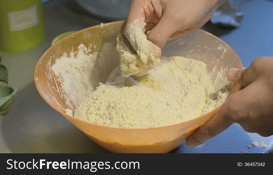 Man hand kneading cinnamon bread dough. Man hand kneading cinnamon bread dough