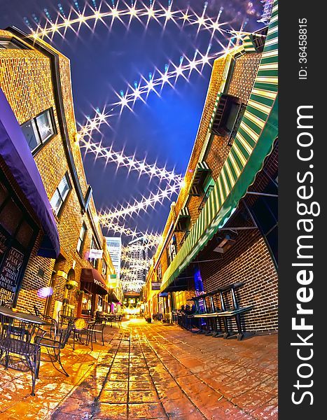 Charlotte, nc - january 1st, 2014: Night view of a narrow alley street with restaurants in charlotte, nc