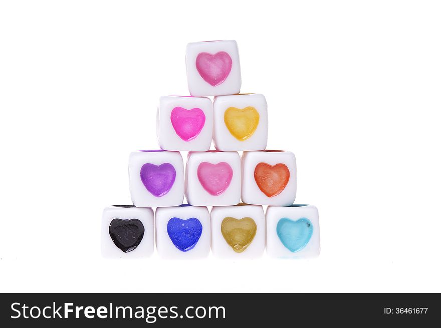 Plastic cubes with colorful heart shapes. Plastic cubes with colorful heart shapes.