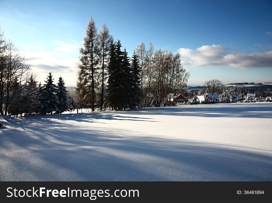 Scenic winter landscape with village