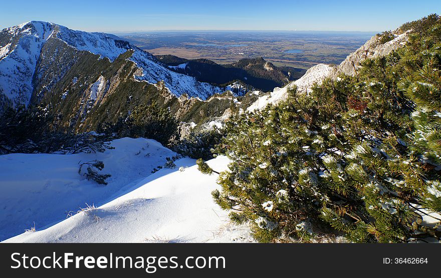 A view of Upper Bavaria from Mount Herzogstand in the Bavarian Alps, with Lake Staffel in the distance.