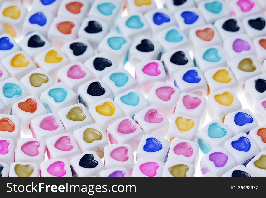 Plastic cubes with colorful heart shapes. Plastic cubes with colorful heart shapes.