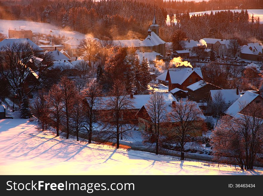 Smoking chimneys in the village