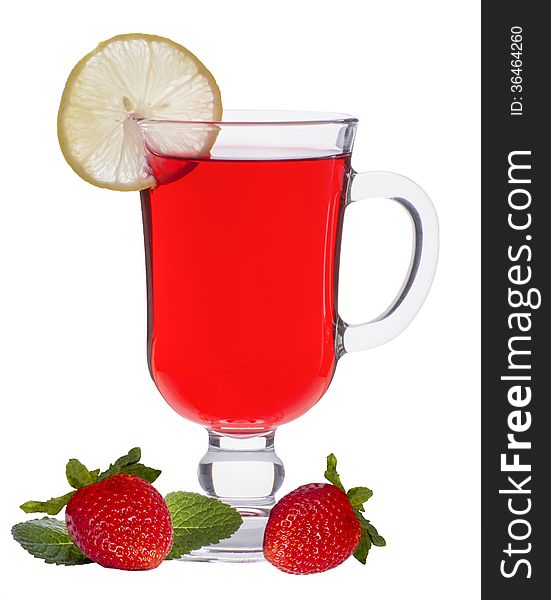 Cup of strawberry tea with mint and a lemon on a white background