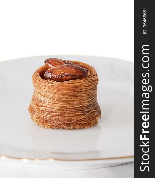 Plate with turkish baklava isolated over white background