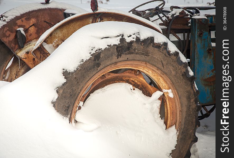 Tractor Wheel in rural canada in wintertime