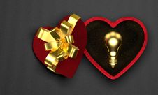 Golden Light Bulb In Heart-shaped Box Royalty Free Stock Images Golden Light Bulb In Heart-shaped Box Royalty Free Stock Images