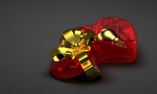Golden Light Bulb In Red Glass Heart-shaped Box Royalty Free Stock Image Golden Light Bulb In Red Glass Heart-shaped Box Royalty Free Stock Image
