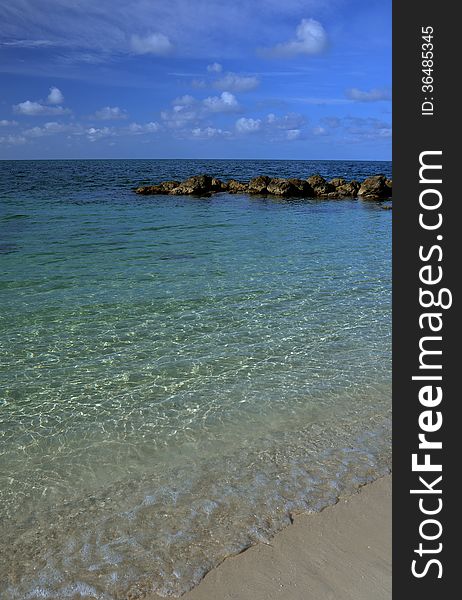 Shallow tropical water and sandy beach in Key West, FL