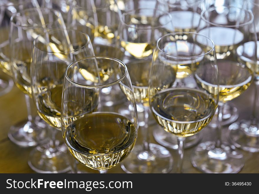 Glasses with wine on table