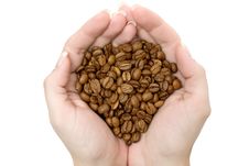 Handful Of Coffee Beans Stock Photo
