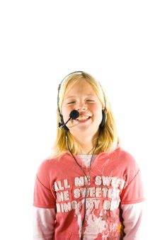 Young Girl With A Headset Stock Images Young Girl With A Headset Stock Images