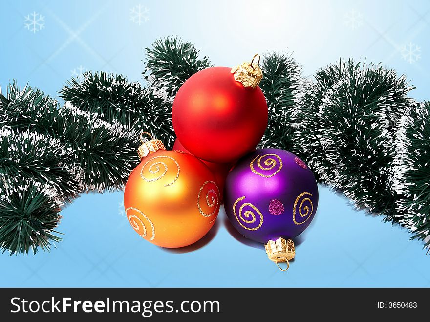 New Year's and  Christmas spheres and tinsel. New Year's and  Christmas spheres and tinsel