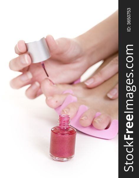 Foot care shot with woman feet over white background. Foot care shot with woman feet over white background