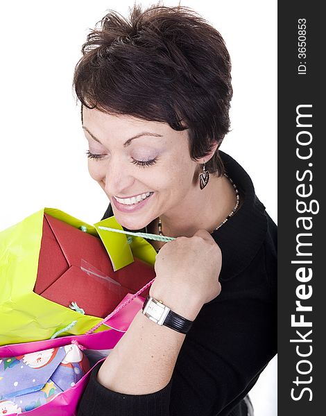 Woman with shopping bags over white background. Woman with shopping bags over white background