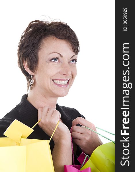 Woman with shopping bags over white background. Woman with shopping bags over white background