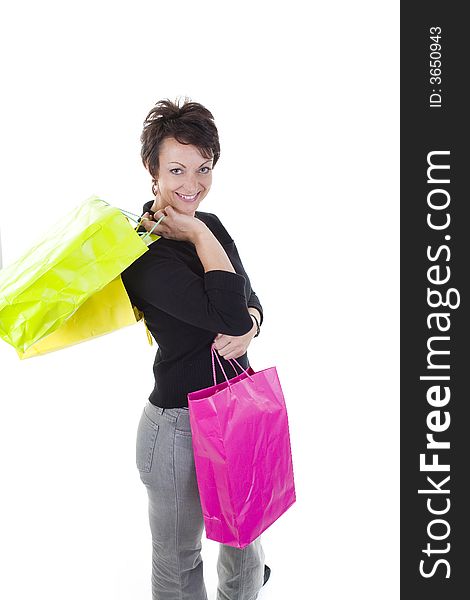 Woman with shopping bags over white background. Woman with shopping bags over white background